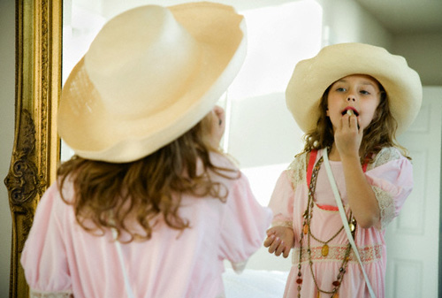 Girl Playing Dress Up --- Image by © Corbis
